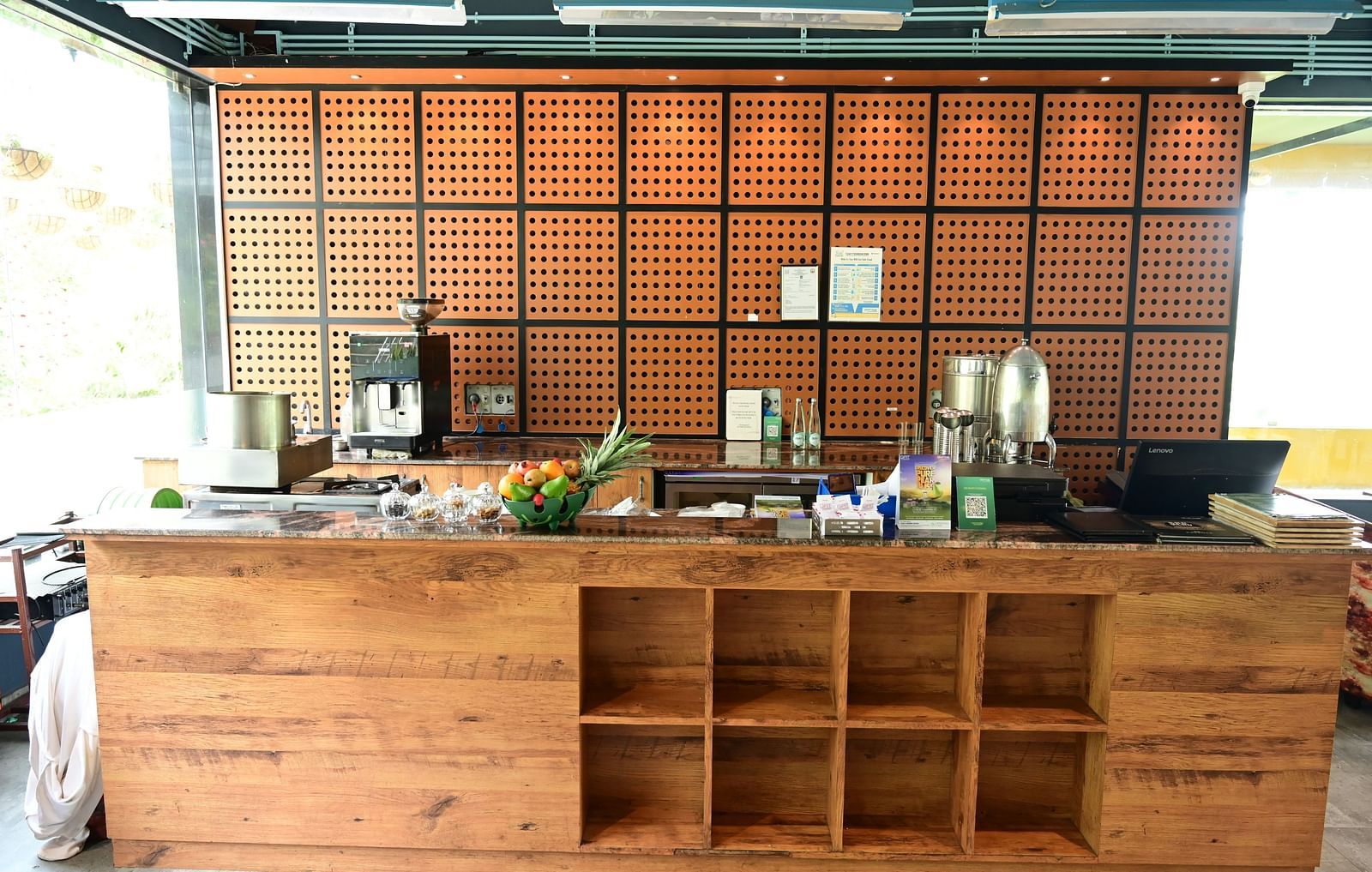 An image of a coffee station with a coffee machine, and other utensils - GReaT trails Kodaikanal by GRT Hotels