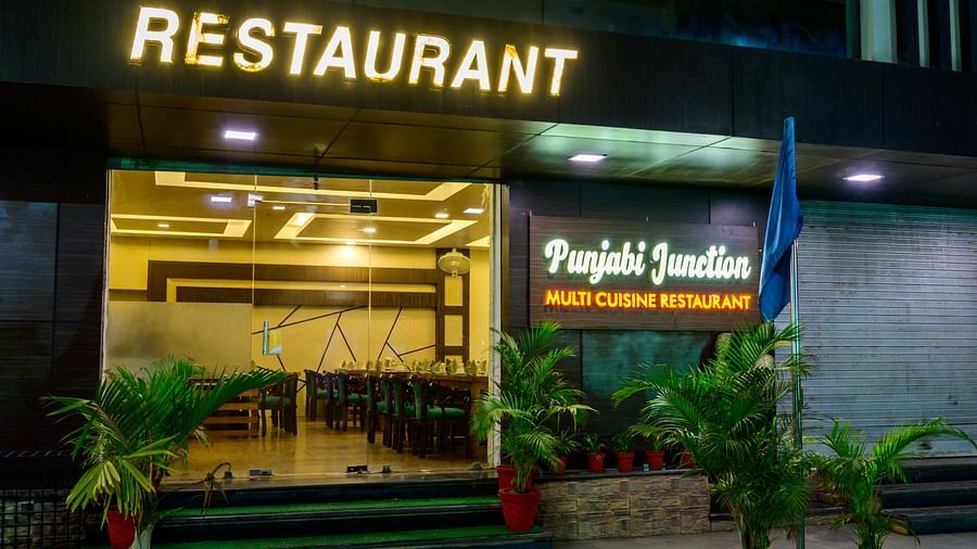 Night view of the Punjabi Junction Restaurant entrance at Biznotel by Pride, Deoghar