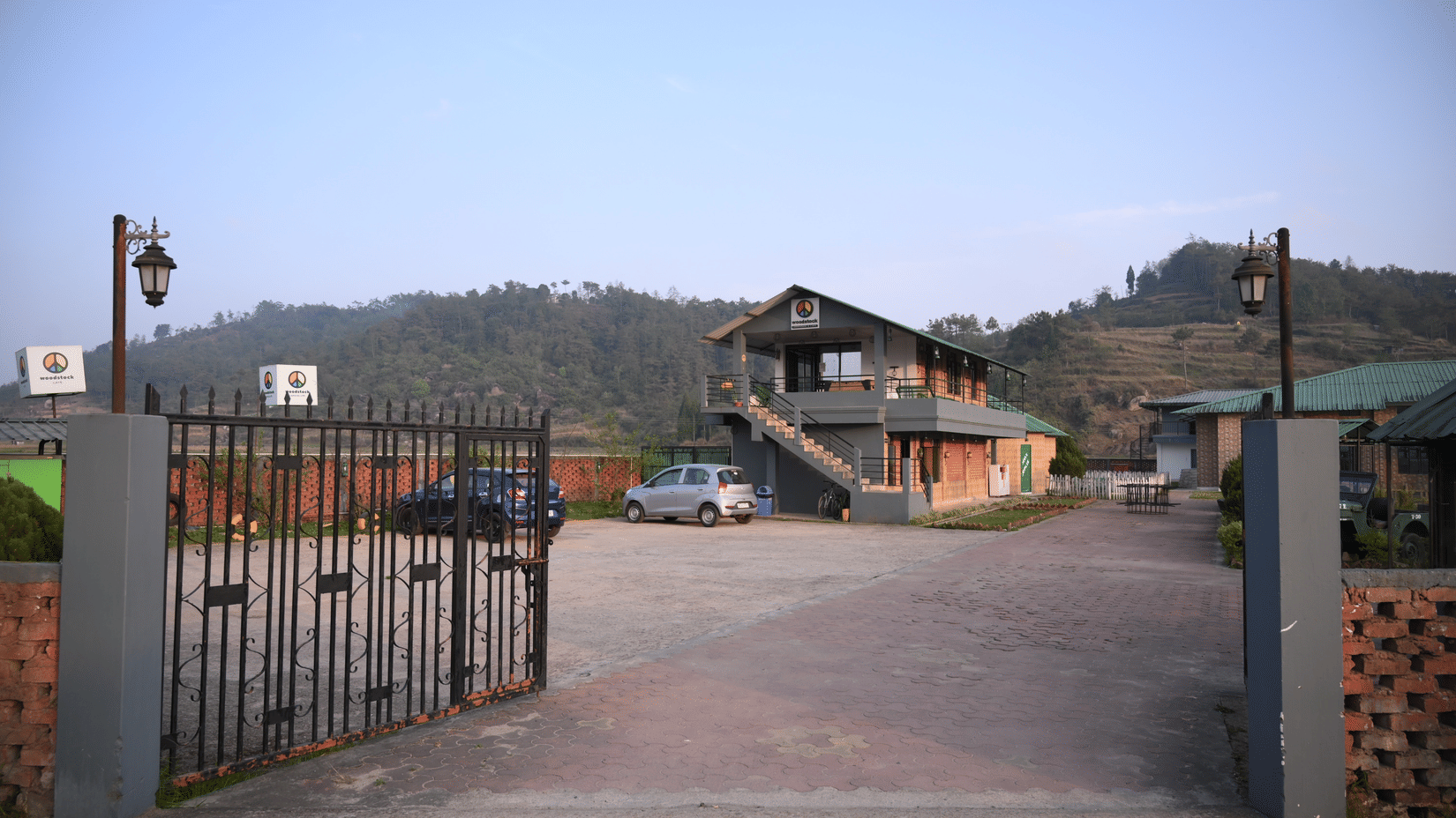 Entrance gate of a woodstock farmhouse and café