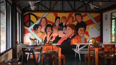 Café with vibrant mural wall