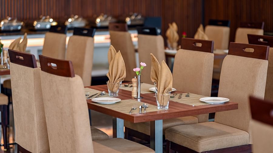 sitting area at the multi-cuisine restaurant in Calicut at Hive 2