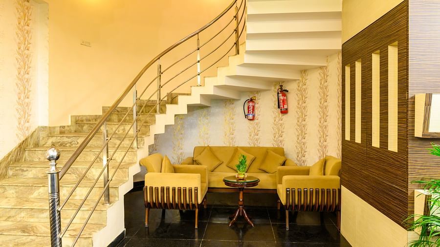 Lobby image featuring a staircase connecting to the upper and lower levels at Biznotel by Pride, Deoghar