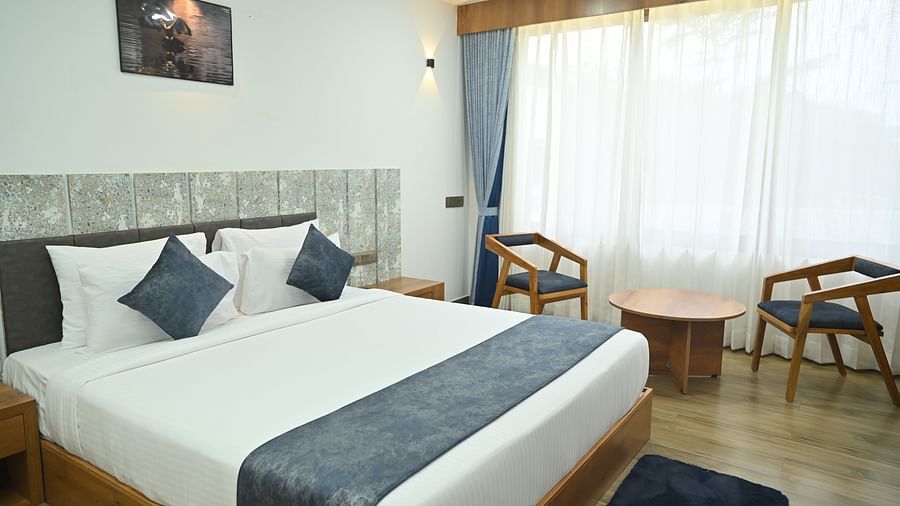a bed room featuring a king size bed at Clarks Safari Kheda, Ahmedabad