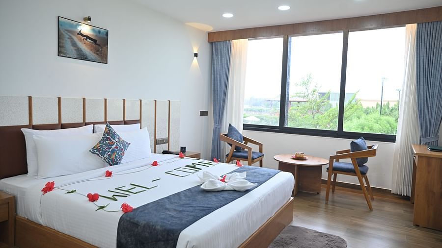 a bed room featuring a king size bed at Clarks Safari Kheda, Ahmedabad
