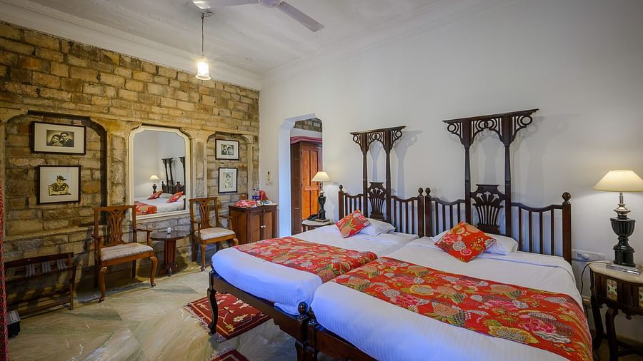 Deo Bagh - 17th Century, Gwalior - twin sharing beds kept side by side at Dhriv Vilas room