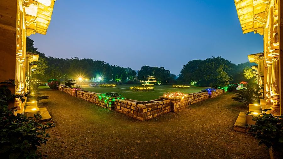 Deo Bagh - 17th Century, Gwalior - view of the lit garden area of the resort in Gwalior during night time