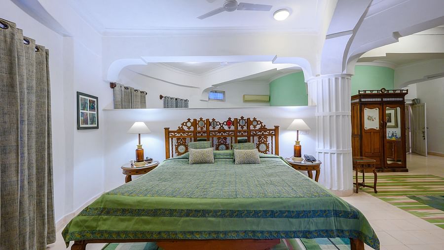 Hill Fort-Kesroli 14th Century Alwar - Interior view of the Fawn Mahal - Countryside View featuring a king size bed with a lamp on either sides