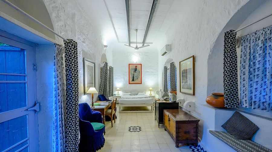 Hill Fort Kesroli 14th Century Alwar - interior view of Papiha Mahal room with blue and white decor