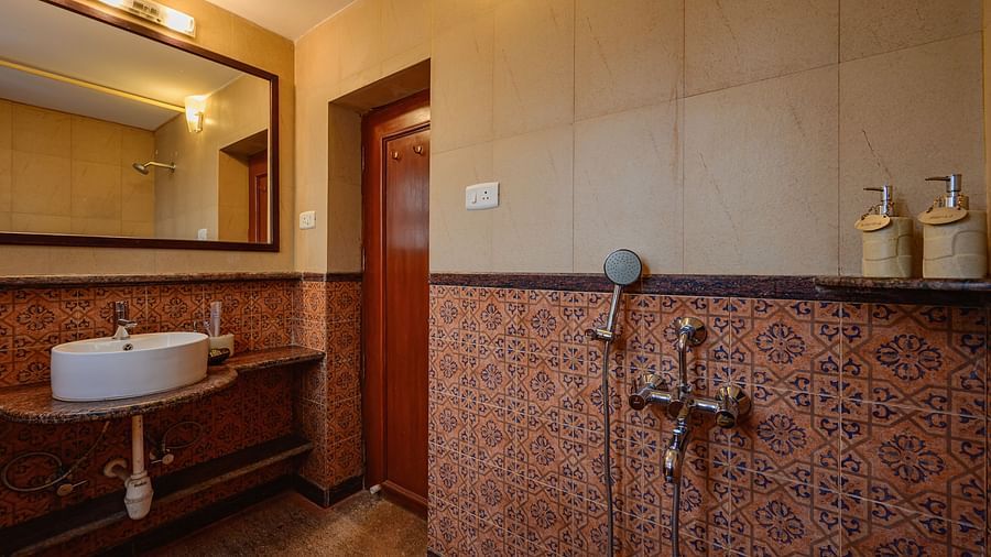 An overview of the bathroom inside Telina - River / Forest View room at neemrana s three waters