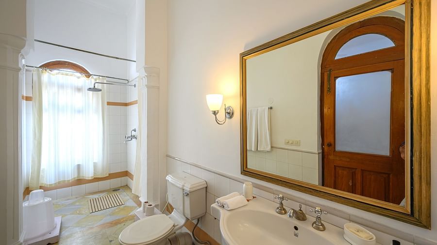 An overview of the bathroom showcasing the shower area inside Maharaja Rajinder Singh room - The Baradari Palace