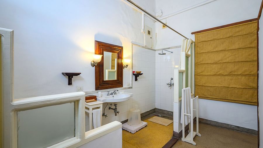 An overview of the bathroom showcasing the sink and shower area inside Maharani Bakhtawar Kaur room - The Baradari Palace