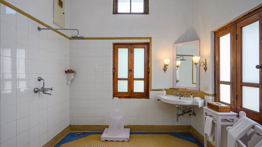 An overview of the bathroom showcasing the shower area inside Maharaja Karam Singh room - The Baradari Palace