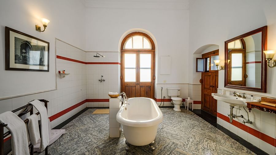 An overview of the bathroom showcasing a tub and wash basin inside Maharaja Yadavindra Singh room - The Baradari palace