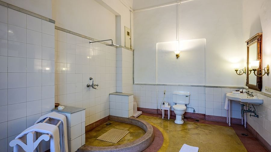 An overview of the bathroom showcasing the shower area inside Raja Amar Singh room - The Baradari Palace