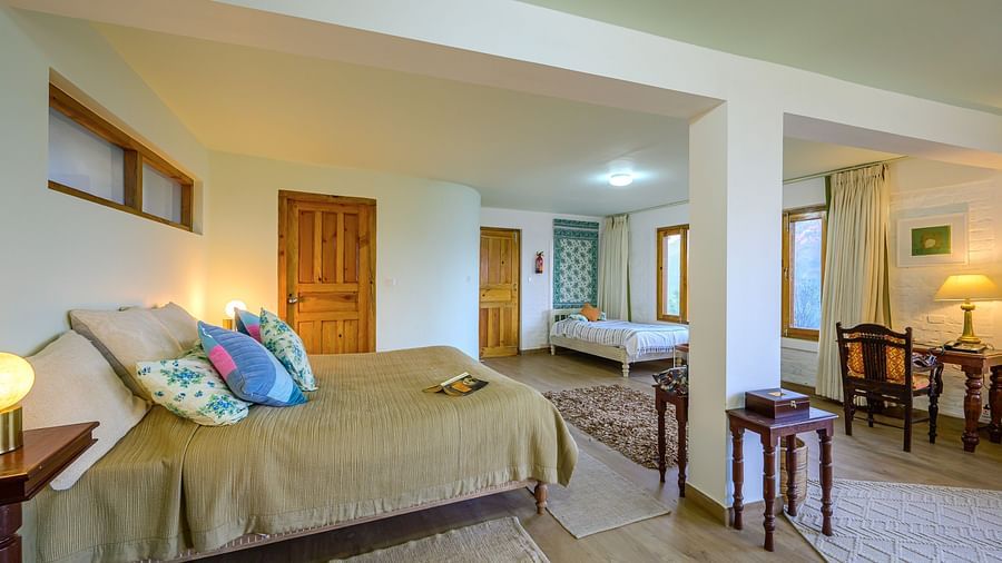 Fig room with spacious interiors, a double bed and a work desk at The Ramgarh Bungalows - 19th Century, Above Nainital.