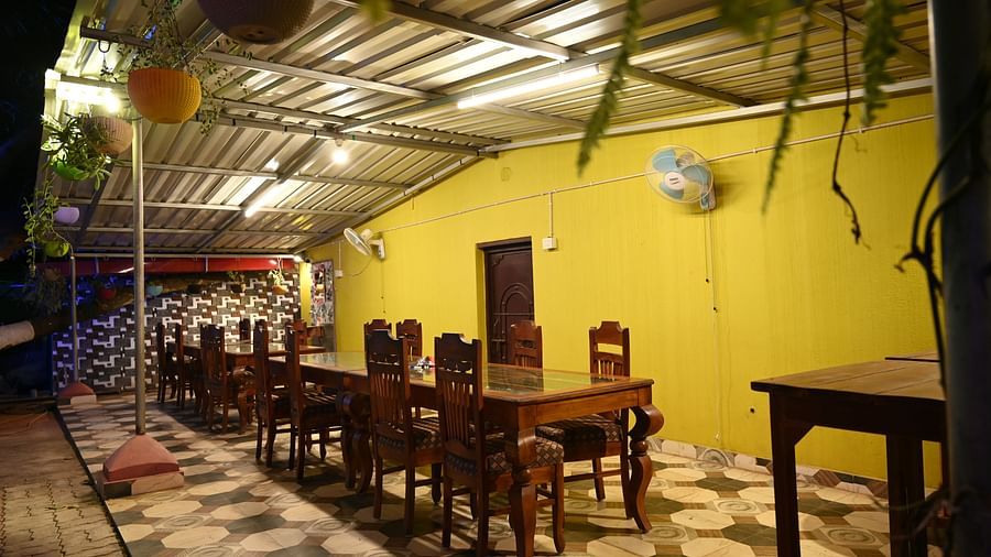 Dining table at Zestful Bites Restaurant in McCluskieganj