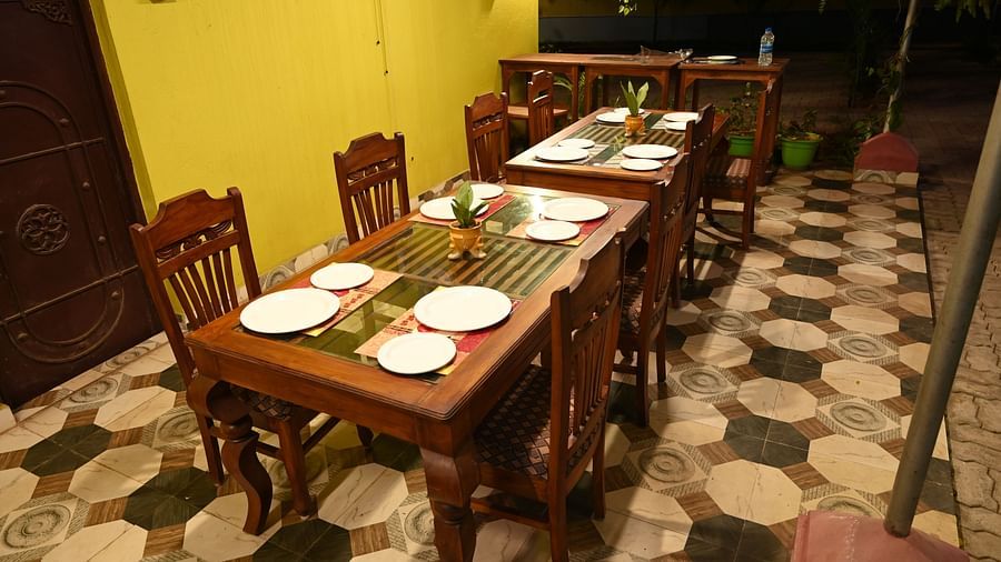 Dining table at Zestful Bites Restaurant in McCluskieganj