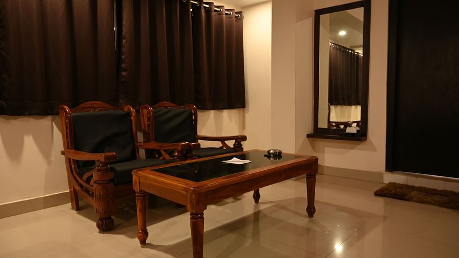 Safari Rooms in McCluskieganj with comfortable seating area at Zeromile by Wedlock Greens