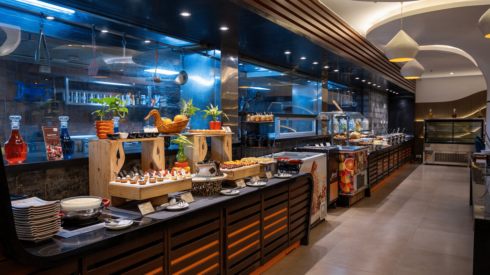 image of varieties of desserts arranged in the buffet area at  Grand Kakinada by GRT Hotels