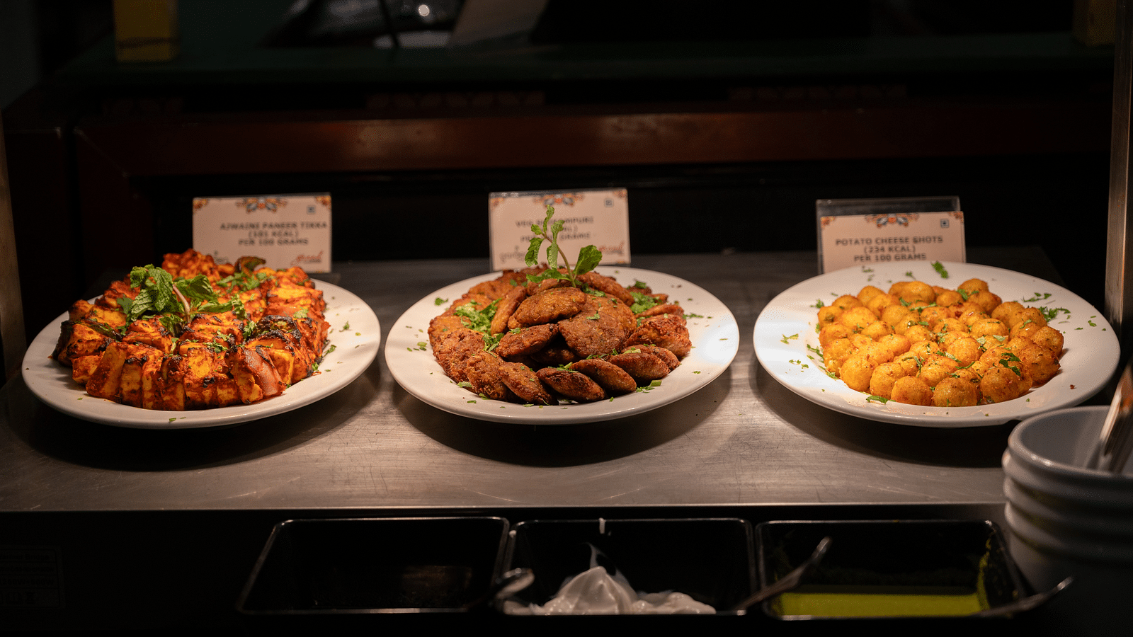 An image of three types of food arranged for display at Grand Kakinada by GRT Hotels
