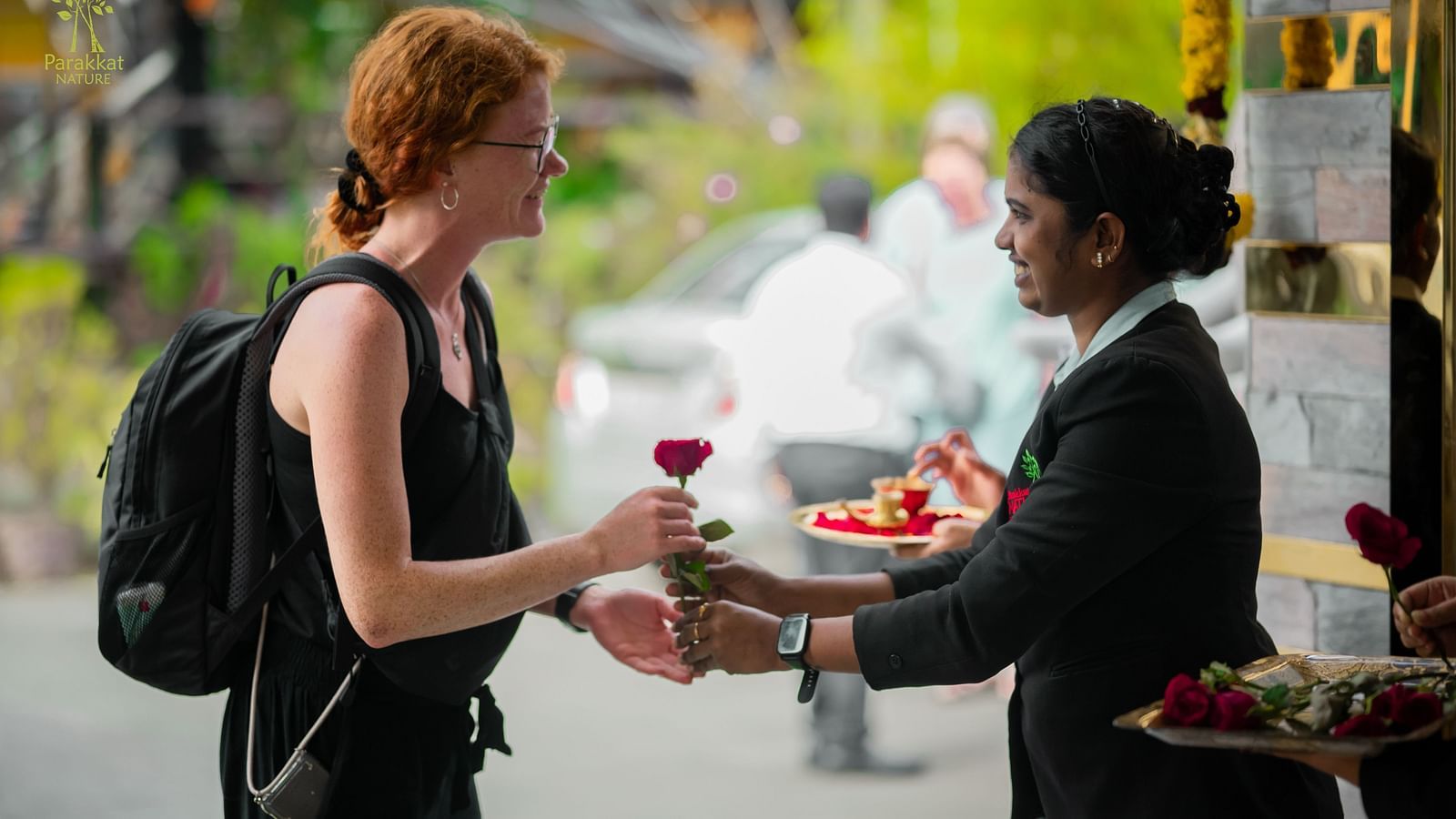Staff offering rose to a Guest at Parakkat Nature Hotel & Resorts, Munnar 22