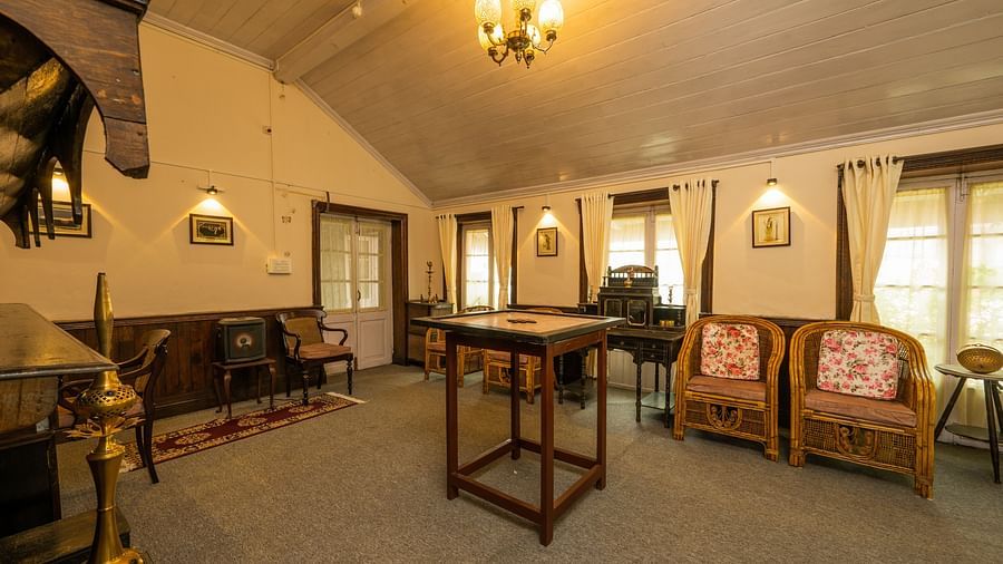 A bird eye view of a spacious Gaming room with wooden furnished table and chair at Arcadia Heritage Resort, Darjeeling