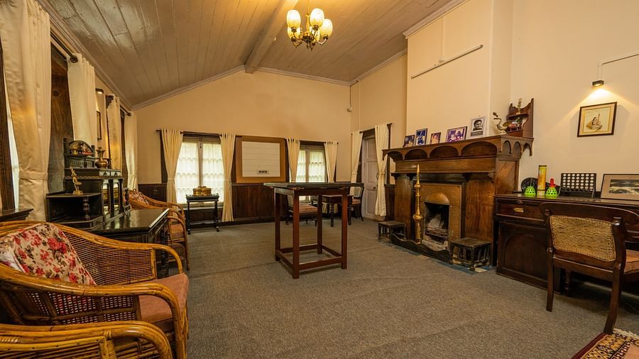 A right angle view of a spacious Gaming room with wooden furnished table and chair at Arcadia Heritage Resort, Darjeeling