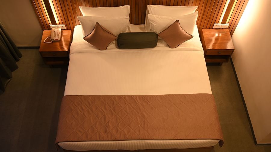 Top view of a double bed at the Kutumbh Suite at Mango Leaf Lake Resort, Pune