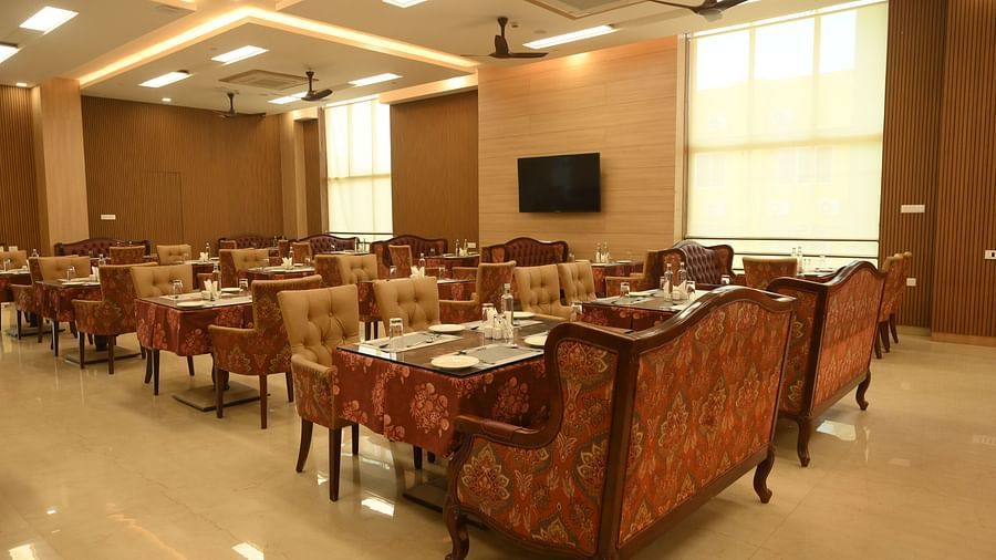 Sofas and chairs as seats at Scoop Restaurant at Mayfair World Cup Village, Rourkela 1