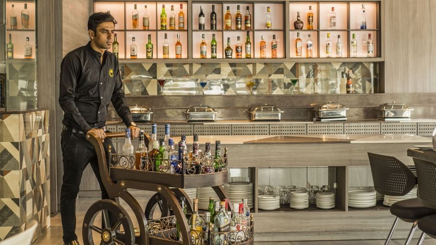 A unique bar setup with a mobile cart at The Citi Residenci Hotel, Asansol.