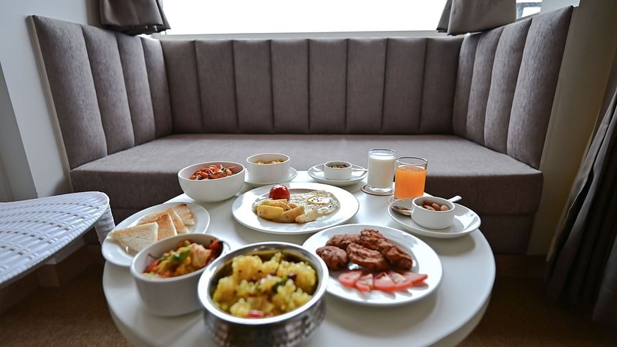 Image of a dining space with a platter of food at The Soma Hotel by Avianna Group, Darjeeling