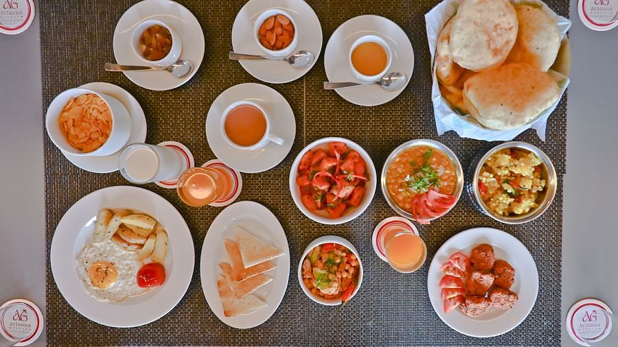 A table filled witn a variety of food items at The Soma Hotel by Avianna Group, Darjeeling
