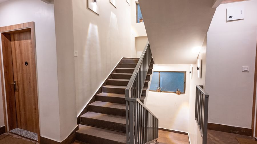 corridor with staircase at the soma hotel by avianna group, darjeeling