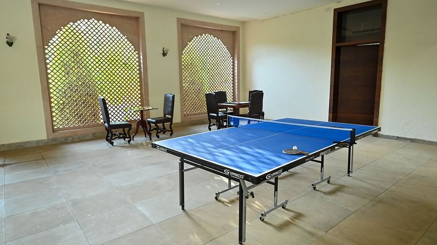 A game room featuring a table tennis court and seating arrangements - Clarks Safari, Ranthambore