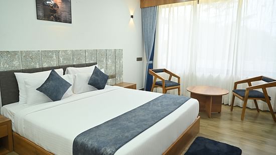 a bed room featuring a king size bed at Clarks Safari Kheda, Ahmedabad