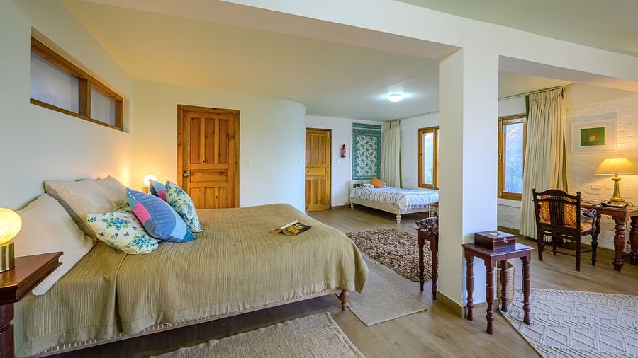 Fig room with spacious interiors, a double bed and a work desk at The Ramgarh Bungalows - 19th Century, Above Nainital.