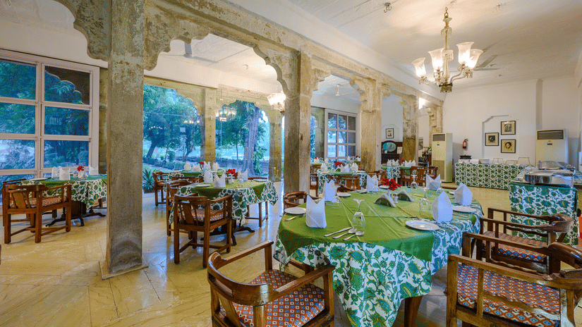 Deo Bagh - 17th Century, Gwalior - the indoor seating space of the resort's restaurant in Gwalior