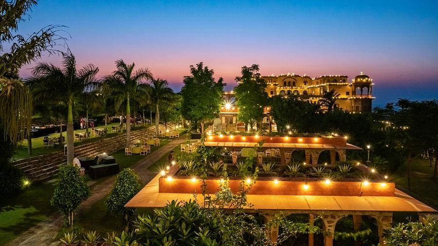 Night view of Tijara Fort-Palace - 19th Century, Alwar with multiple hued sky in the background.