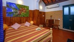 king size bed with air-conditioner and arm chair 