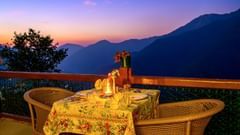 Night view of outdoor seating set-up overlooking the valley at The Ramgarh Bungalows - 19th Century, Above Nainital.