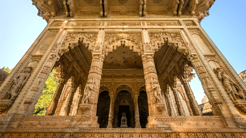 Deo Bagh - 17th Century, Gwalior - view of an entrance of brown coloured temple with designs carved on its facade