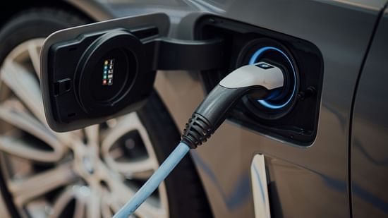 An electric car being charged at a station