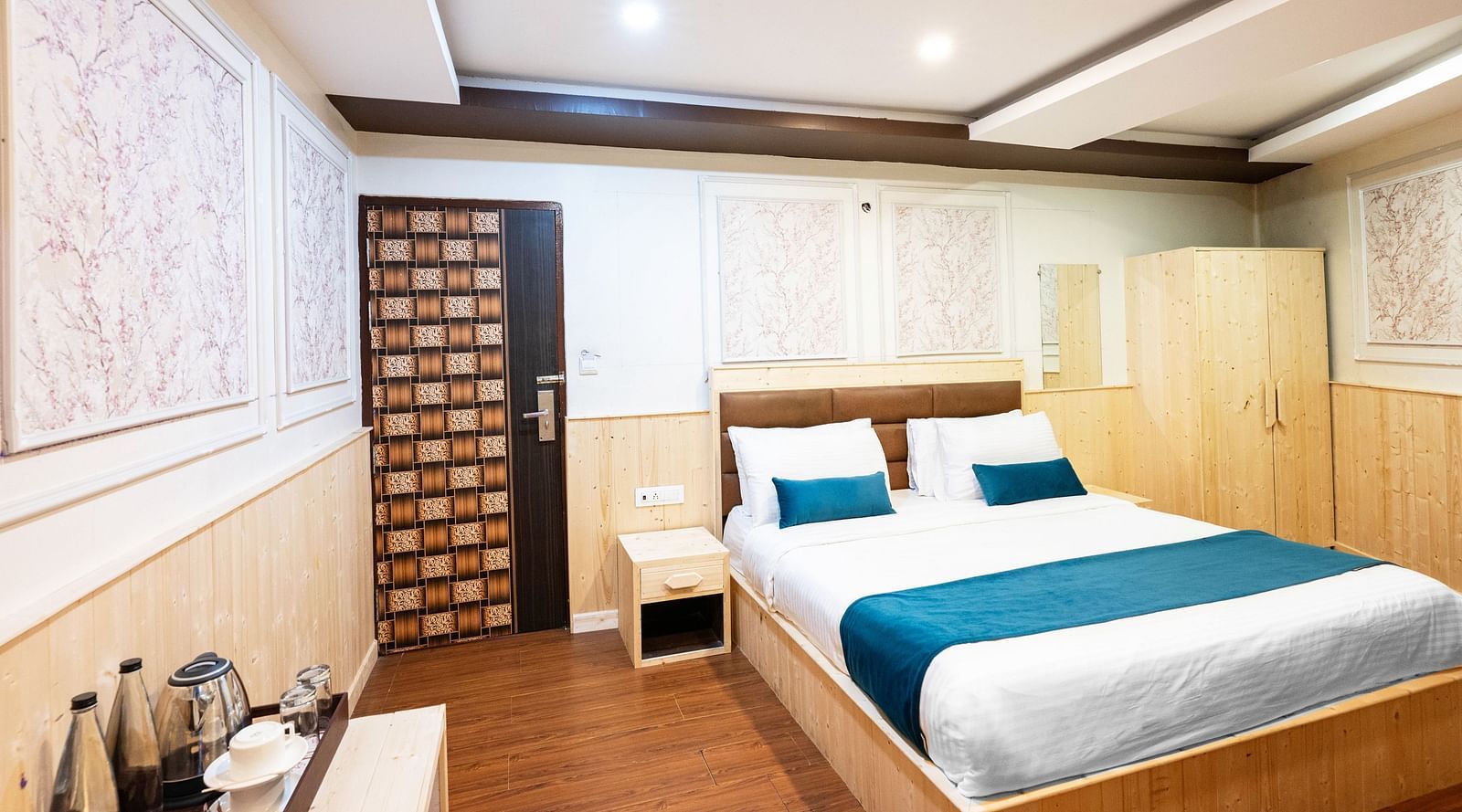 an image of a deluxe room with a tea and a coffee maker at Avianna New Mandala Hotel & Spa, Darjeeling