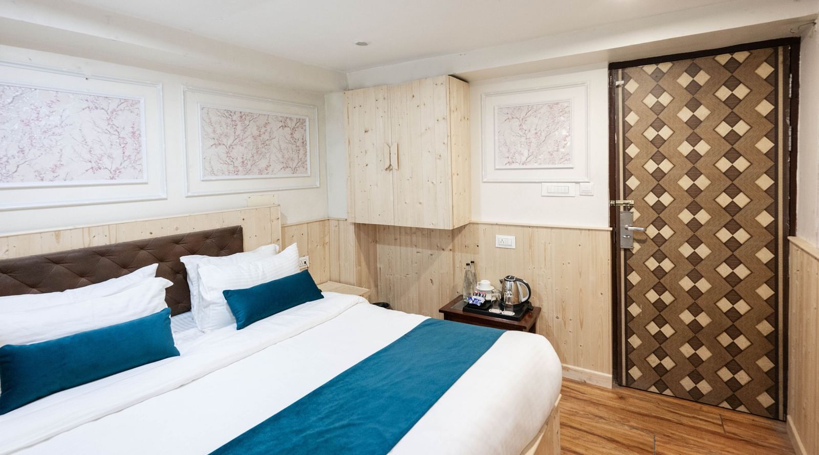 an image of aside view of a standard room with tea and coffee maker at Avianna New Mandala Hotel & Spa, Darjeeling