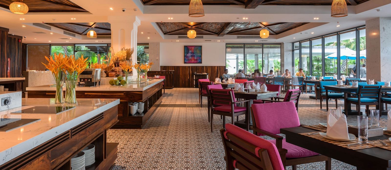 An image of a a huge sitting area with sectioned set ups An image of a huge sitting area of with several chairs and centre tables - Alibu Resort Nha Thrang