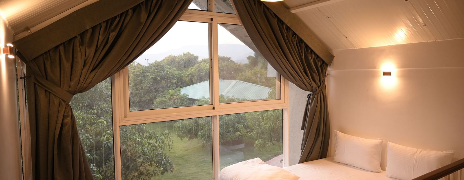 View from the attic in Kutubmh Suite at Mango Leaf Lake Resort, Pune