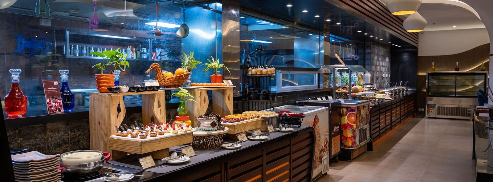 image of varieties of desserts arranged in the buffet area at  Grand Kakinada by GRT Hotels