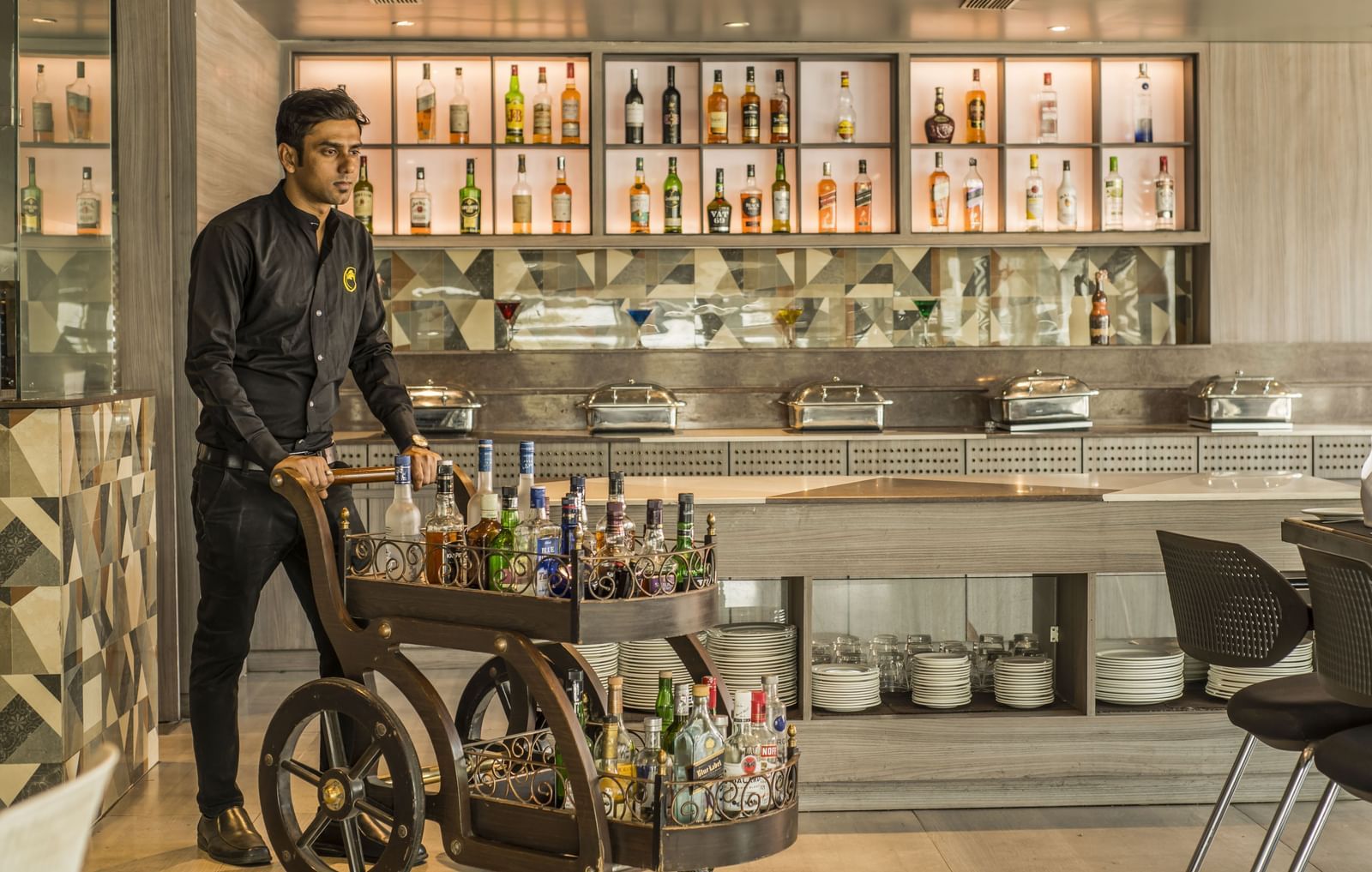 A unique bar setup with a mobile cart at The Citi Residenci Hotel, Asansol.