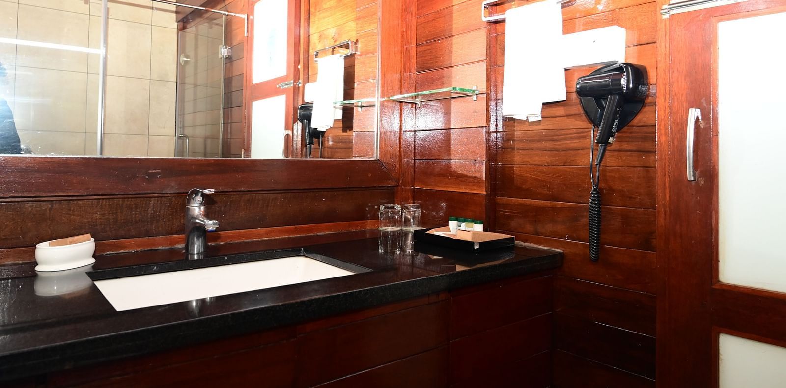 An image of a washroom with toiletries - GReaT trails Kodaikanal by GRT Hotels