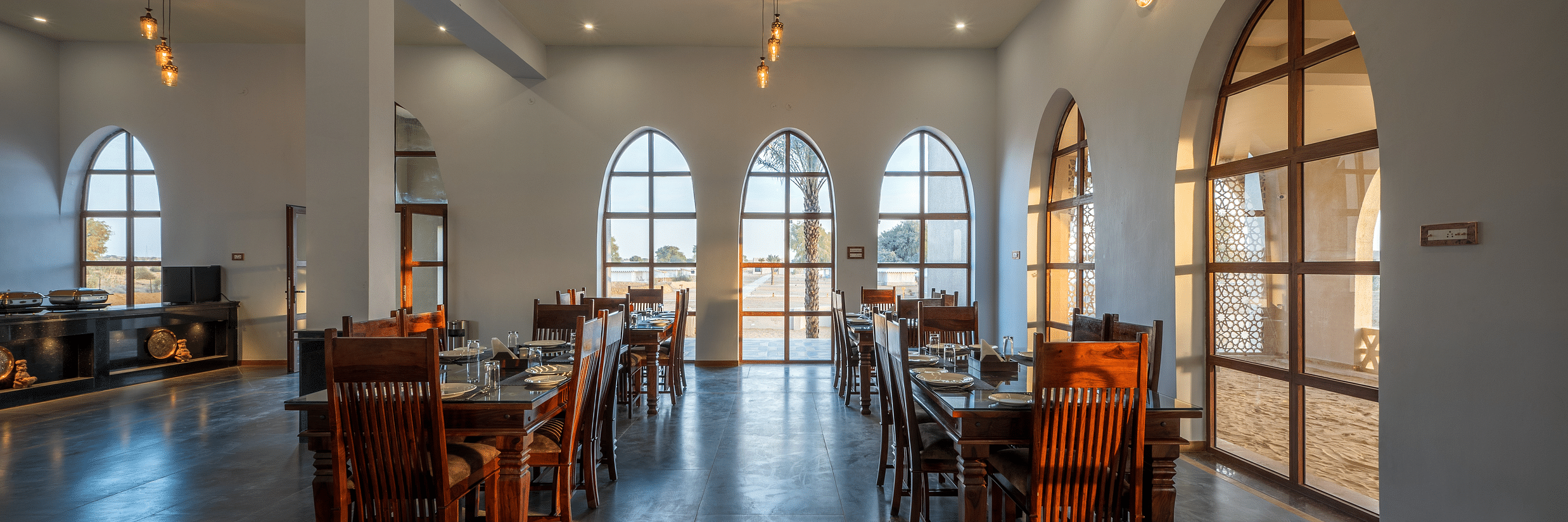 The elegant interiors of a dining hall - Karwaan Jaisalmer
